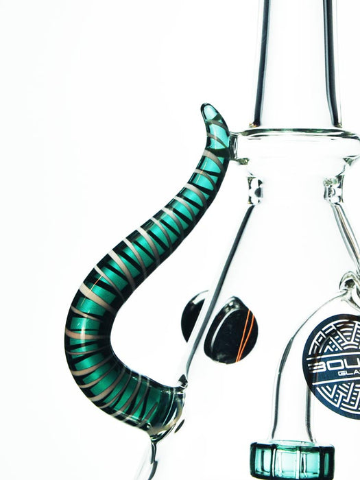 side view of teal horn with swirl accents by Bougie Glass.