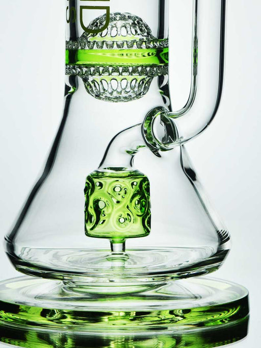The barrel percolator in transparent green glass with a swiss hole design
