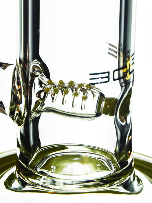 closeup of gridded inline perc with green accent by Bougie Glass.